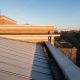Large commercial metal roof installation and replacement for brick commercial property