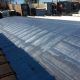 Barrel Flat Roof For Commercial Property On a sunny day