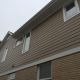 horizontal beige Composite siding installed for residential home